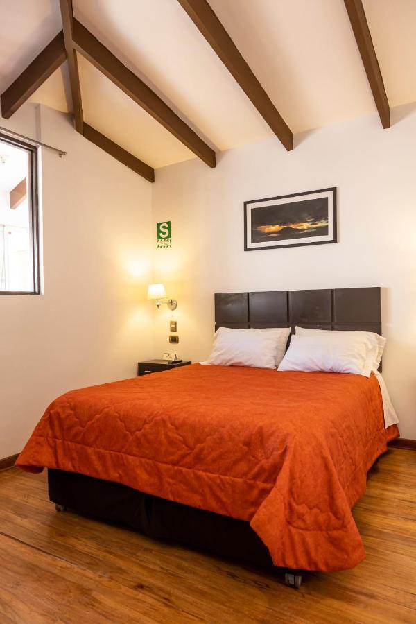 Hostal & Apartments El Triunfo Cusco Luaran gambar