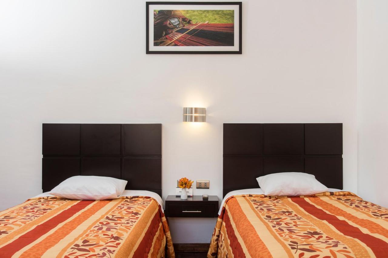 Hostal & Apartments El Triunfo Cusco Luaran gambar