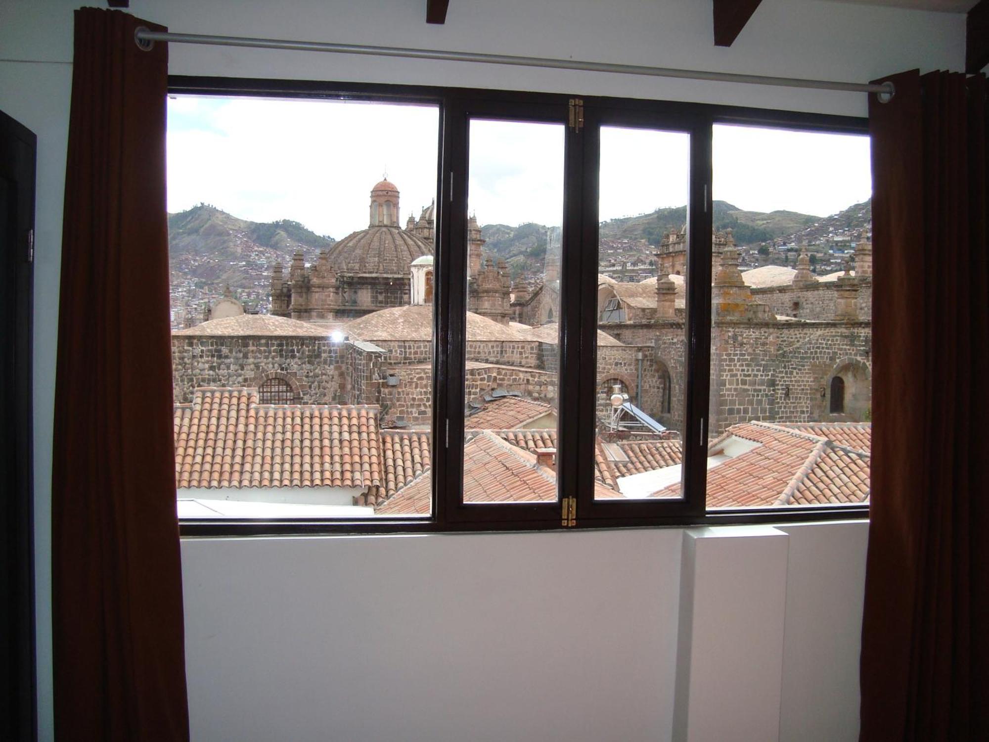 Hostal & Apartments El Triunfo Cusco Luaran gambar