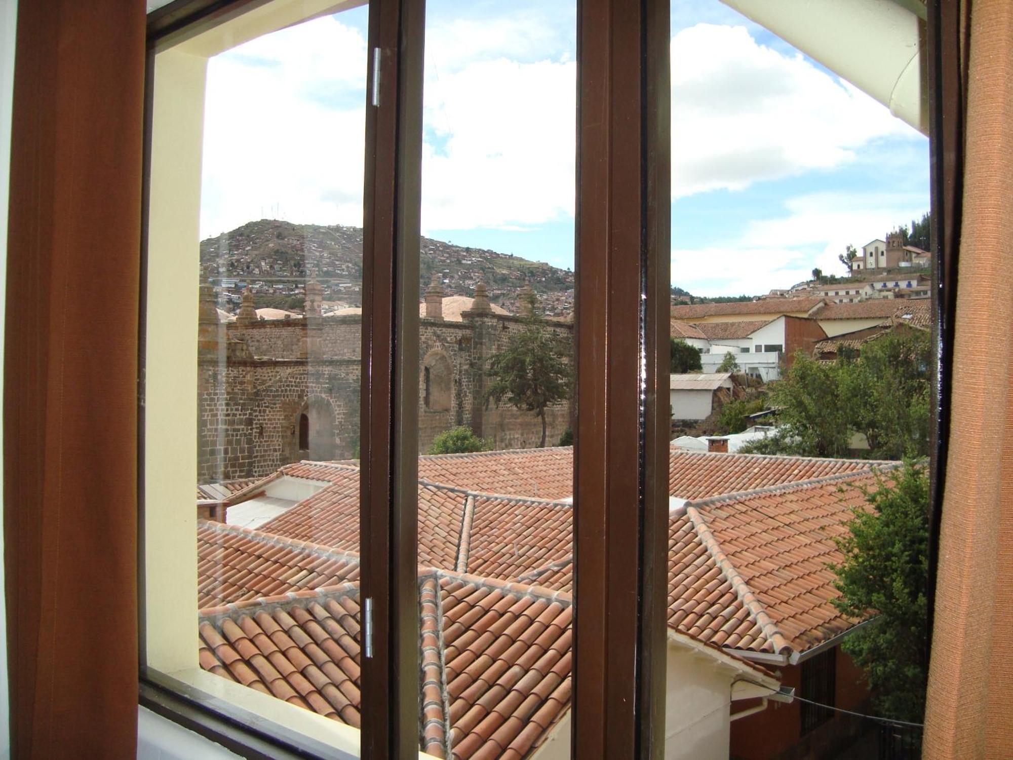 Hostal & Apartments El Triunfo Cusco Luaran gambar