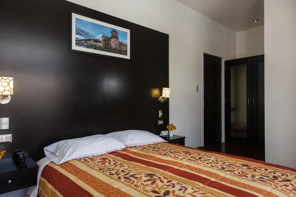 Hostal & Apartments El Triunfo Cusco Luaran gambar