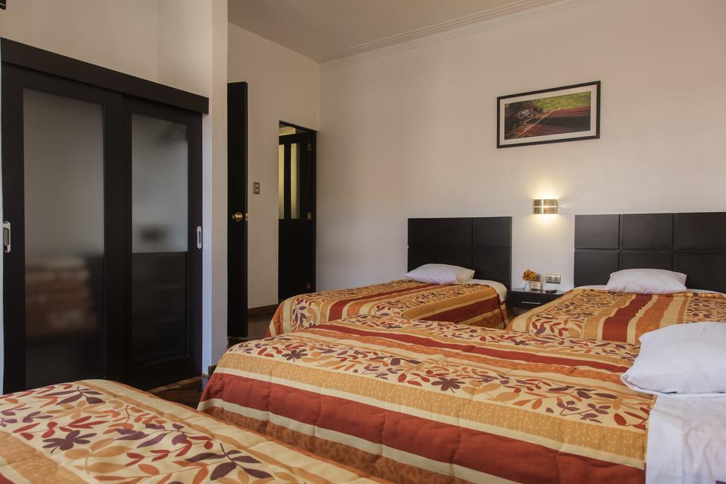 Hostal & Apartments El Triunfo Cusco Luaran gambar