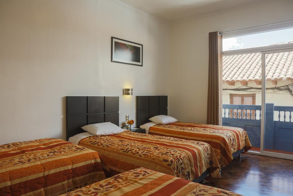 Hostal & Apartments El Triunfo Cusco Luaran gambar