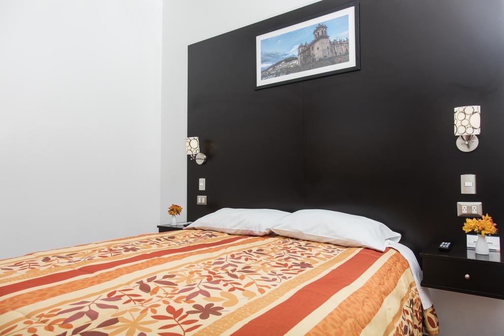 Hostal & Apartments El Triunfo Cusco Luaran gambar