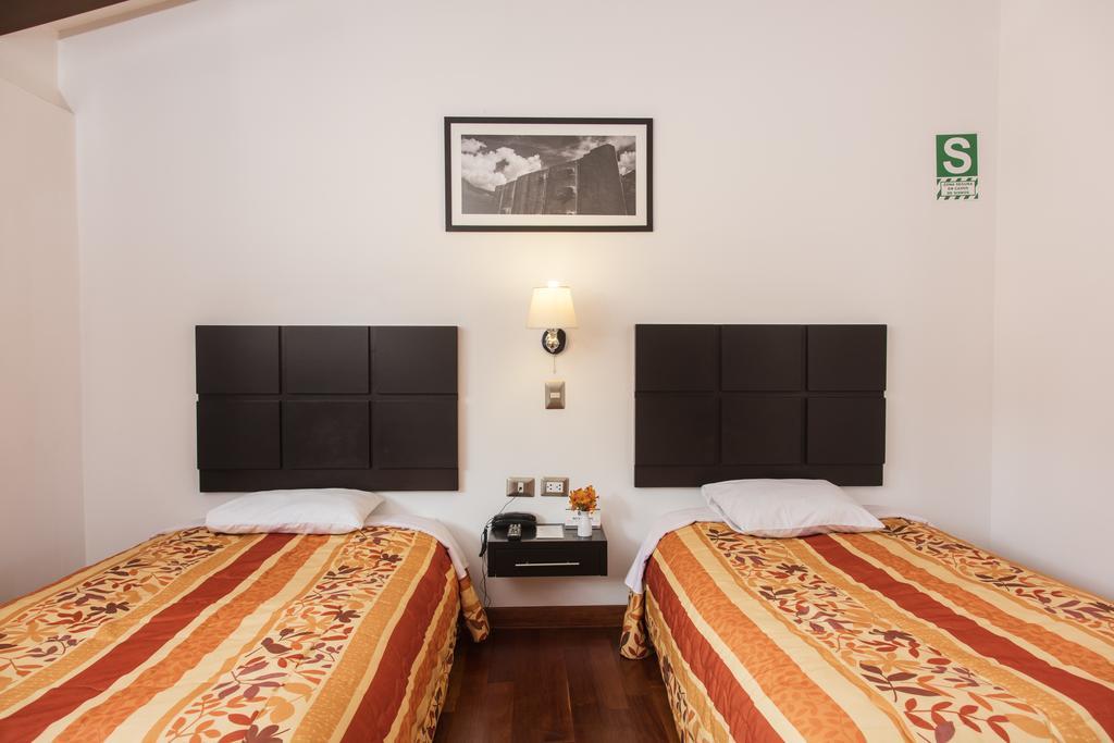 Hostal & Apartments El Triunfo Cusco Luaran gambar